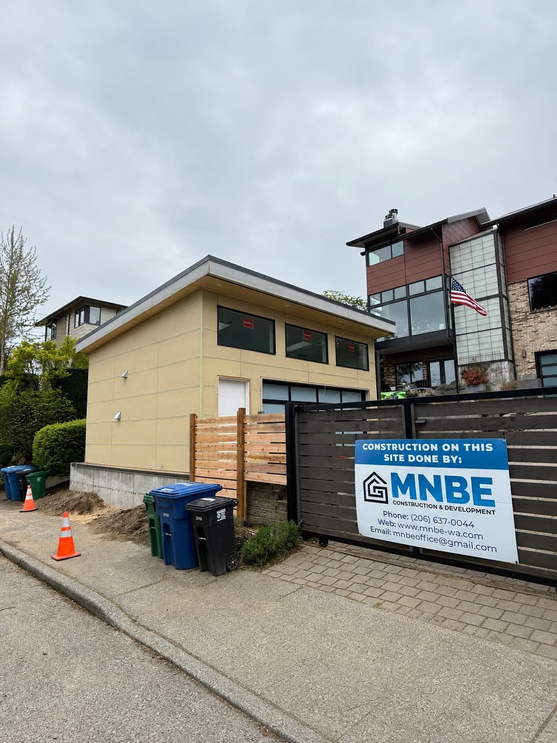Magnolia DADU jobsite mid-build, sided exterior with MNBE jobsite sign