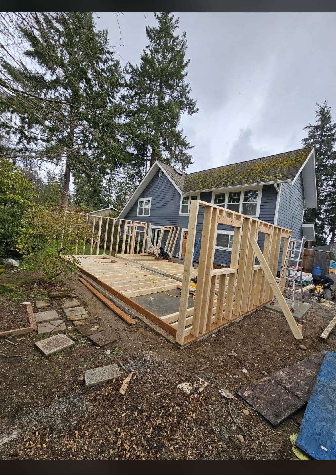 Walls framed + tied to existing house